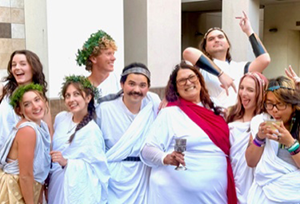 Eta Sigma Phi - group of students in togas and laurel wreaths on head